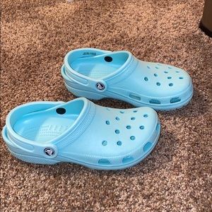 teal crocs